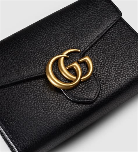 gucci small wallet on chain.